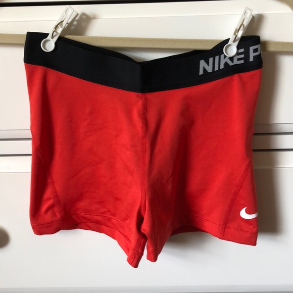 red nike pros